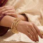 Load image into Gallery viewer, Set Of 4 Gold-Plated AD-Studded Bangles