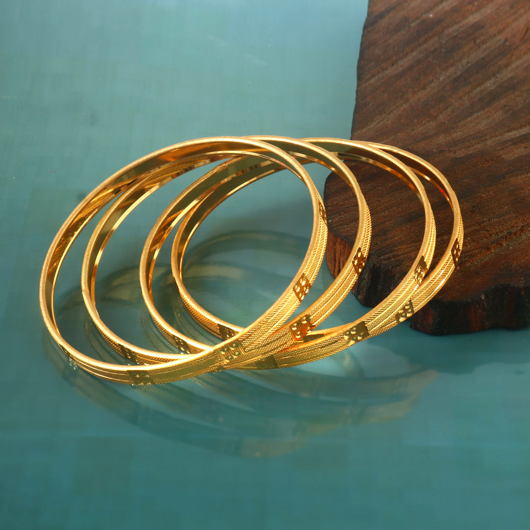 Set Of 4 Gold Plated Cutwork Bangles